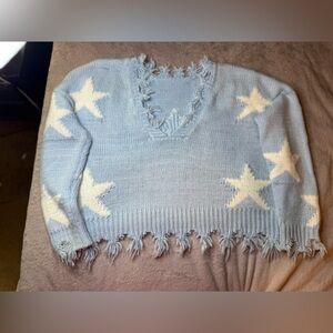 Storia Blue and White V-Neck Sweater with Star Pattern